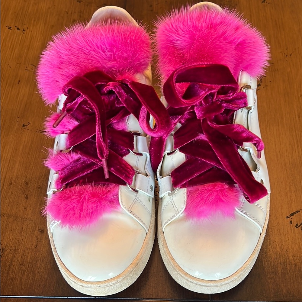 Sold on another site Moncler sneakers in wonderful condition with mink tongue